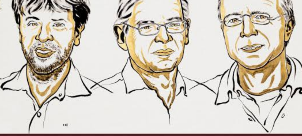 Grafika informująca o przyznaniu Nagrody Nobla z fizjologii lub medycyny. Na ilustracji znajdują się portrety trzech laureatów: Karla Deisserotha, Petera Hegemanna i Georga Nagela. U góry widnieje napis „Nobel z fizjologii i medycyny”, a na dole: „Za kanały jonowe aktywowane światłem i w dziedzinie optogenetyki”. W lewym górnym rogu znajduje się logo „Zielone Wiadomości”.